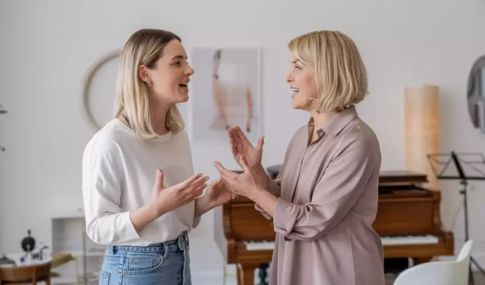 A vocal coach working with a student on passaggio and learning to transition between registers